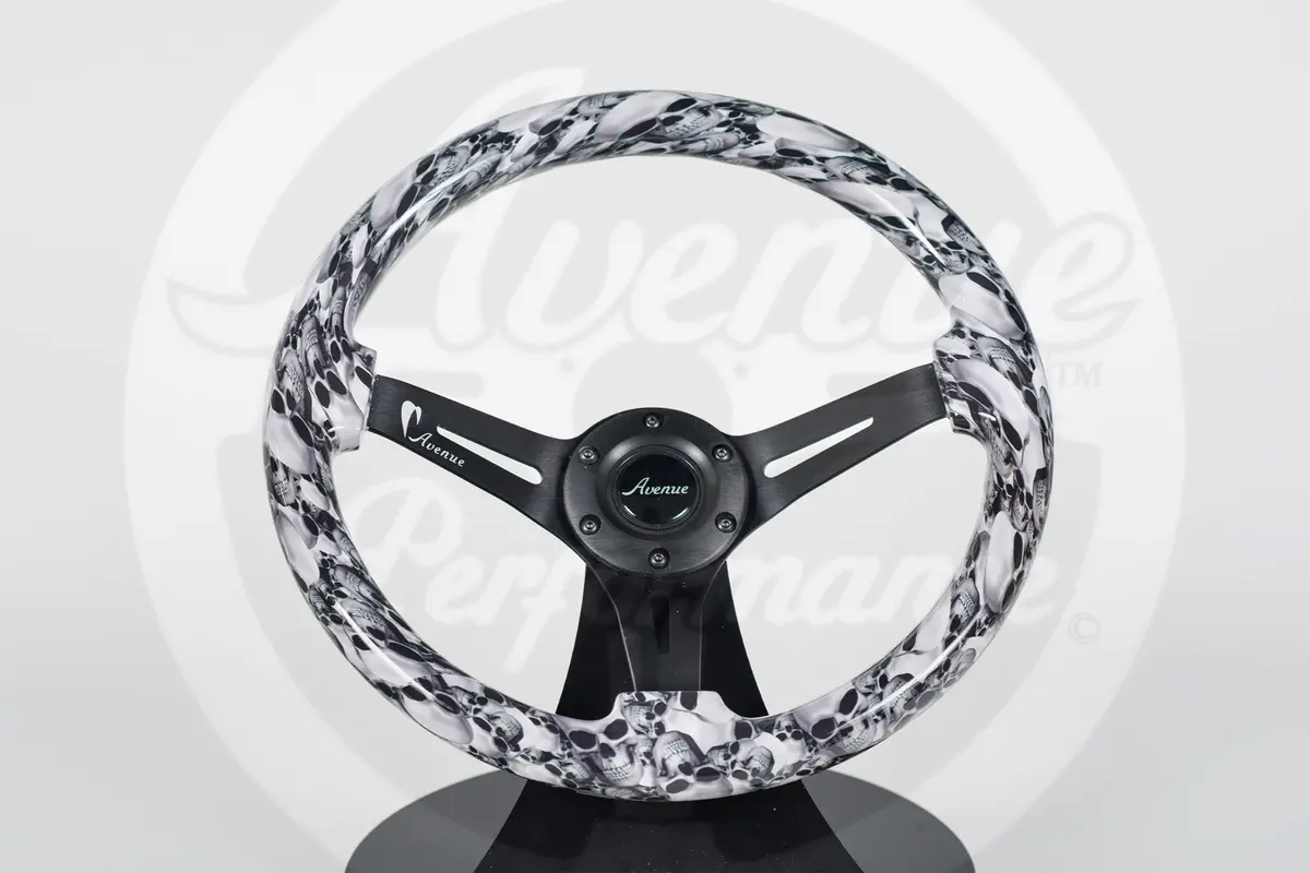 Avenue White Skulls/ Black Spokes Hydro Dipped Steering Wheel 1